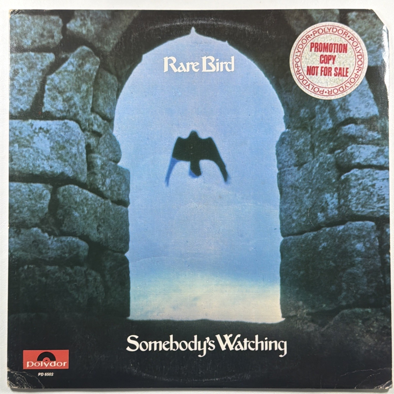 Rare Bird - Somebody's Watching LP Polydor Records PD-6502 NM 1973 Promo Insert
