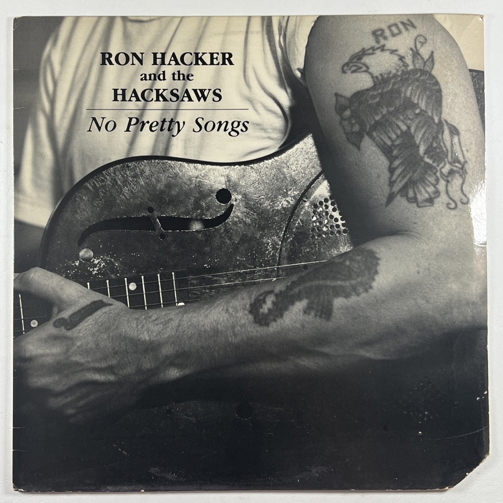 Ron Hacker And The Hacksaws “No Pretty Songs” LP/Hacksaw Records (EX) 1988