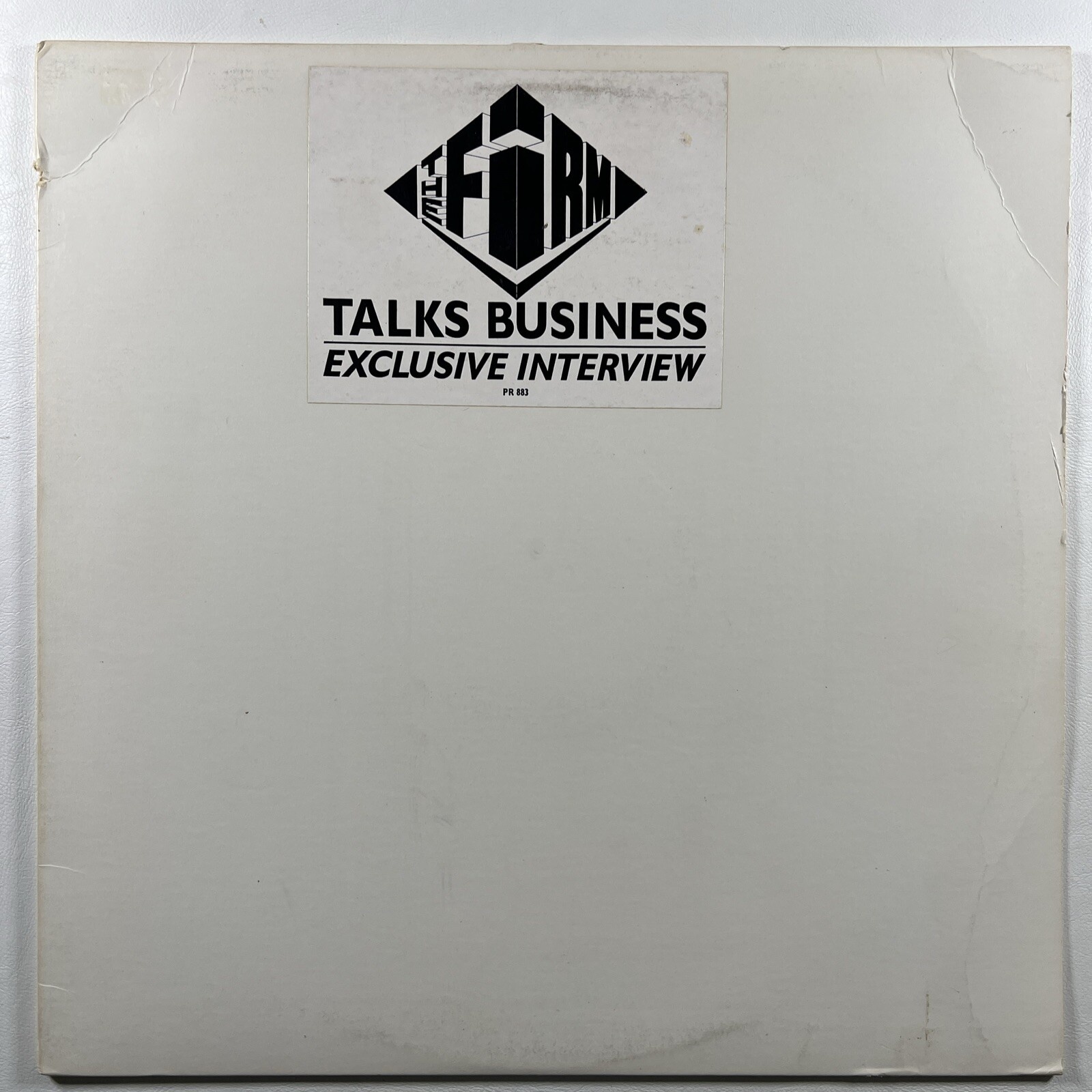 The Firm “Talks Business Exclusive Interview” LP/PR883 (EX) Promo Insert 1986